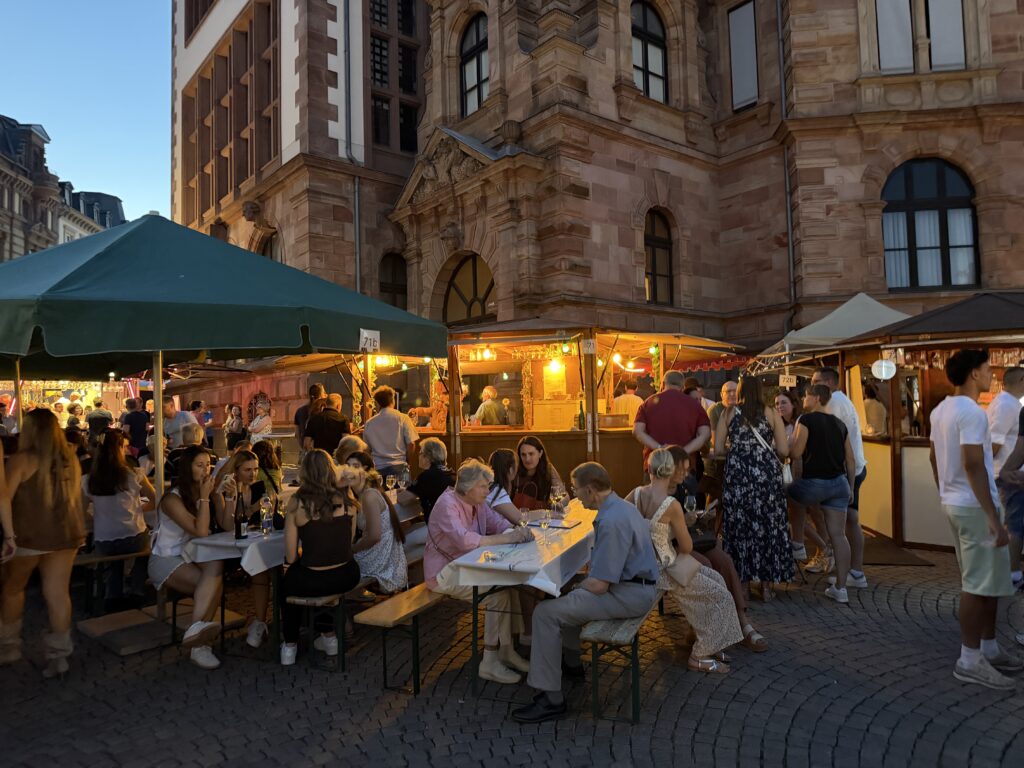 Crowd gathered in Wiesbaden under tents during the annual Rheingau Wine Festival in Wiesbaden Germany