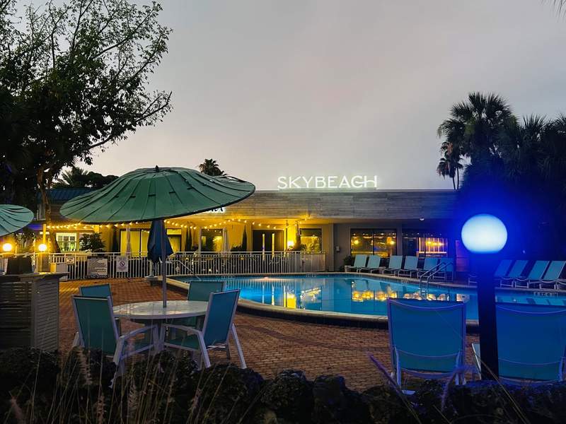 SkyBeach patio and pool, with SkyBeach sign on top of building