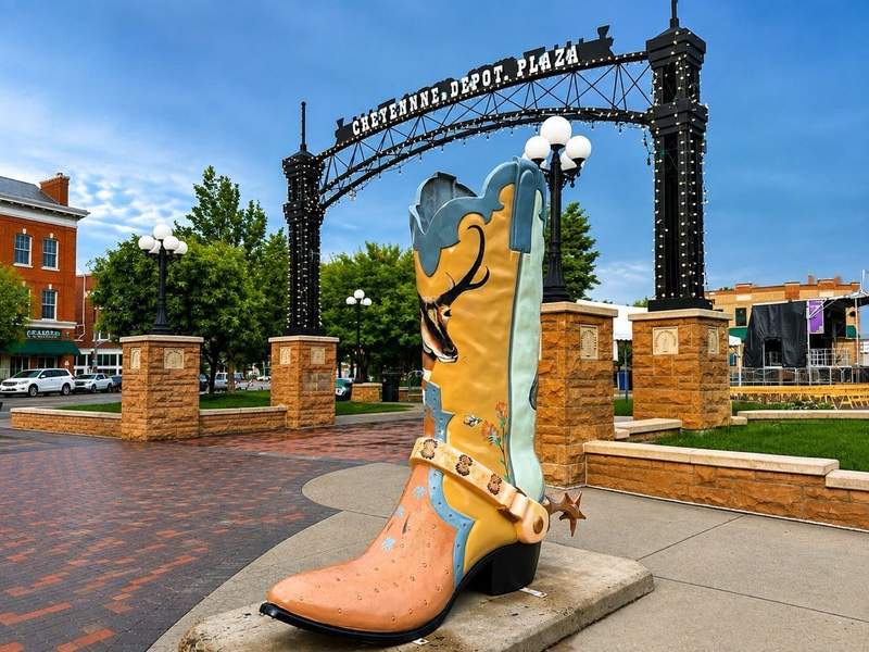 Colorful cowboy boot sculpture in front of the Cheyenne Depot Plaza entrance in downtown Cheyenne.