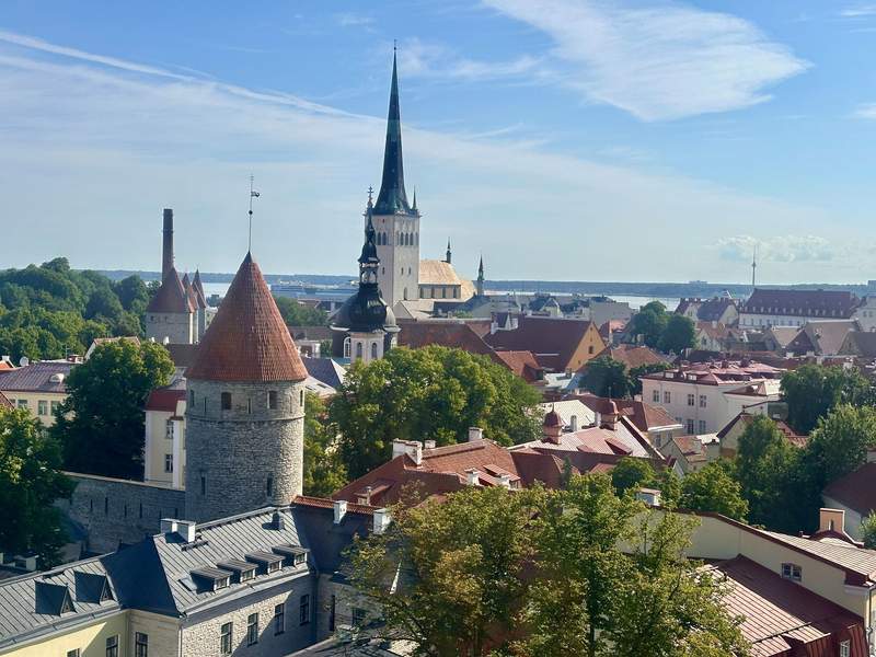 Red rooftops medieval towers and church spires in Tallinn Old Town Estonia
