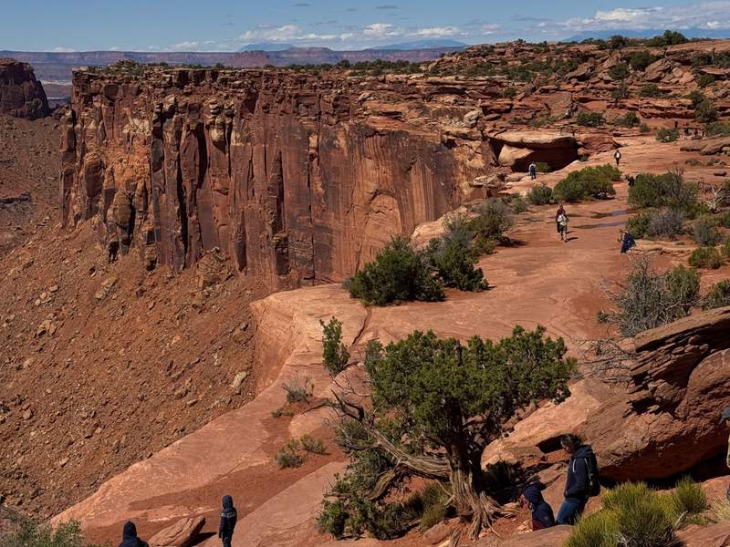 Horizontal panoramic view looking over sandstone cliffs and deep canyons at Canyonlands National Park