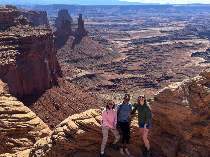 Horizontal panoramic view looking over sandstone cliffs and deep canyons at Canyonlands National Park