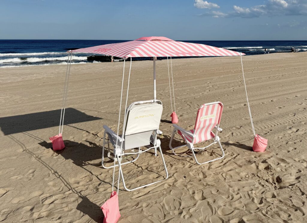 The Sunflow Happy Hut Cabana set up on the sand