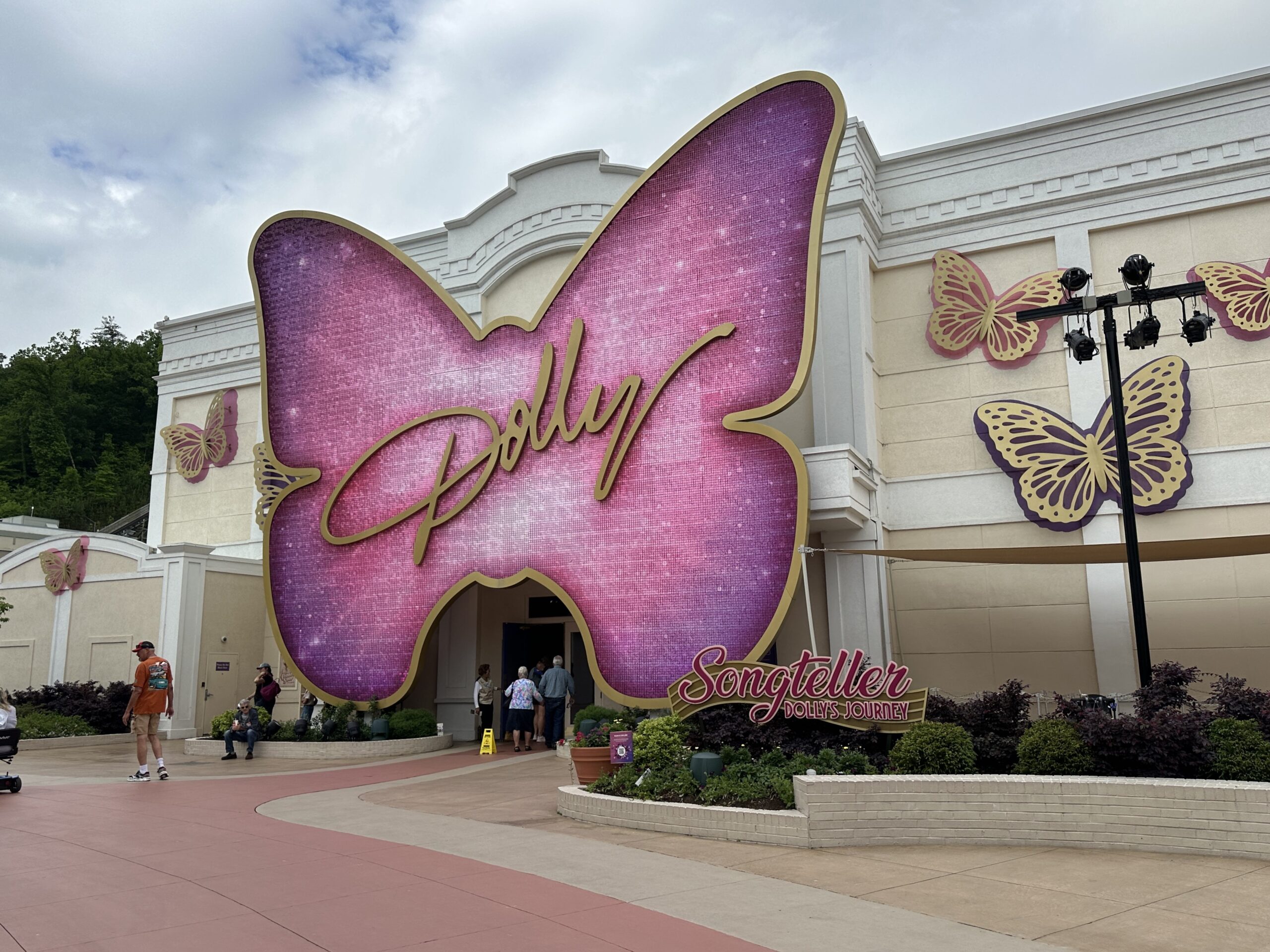 A butterfly in the front of the building of the storyteller exhibit at Dollywood. 