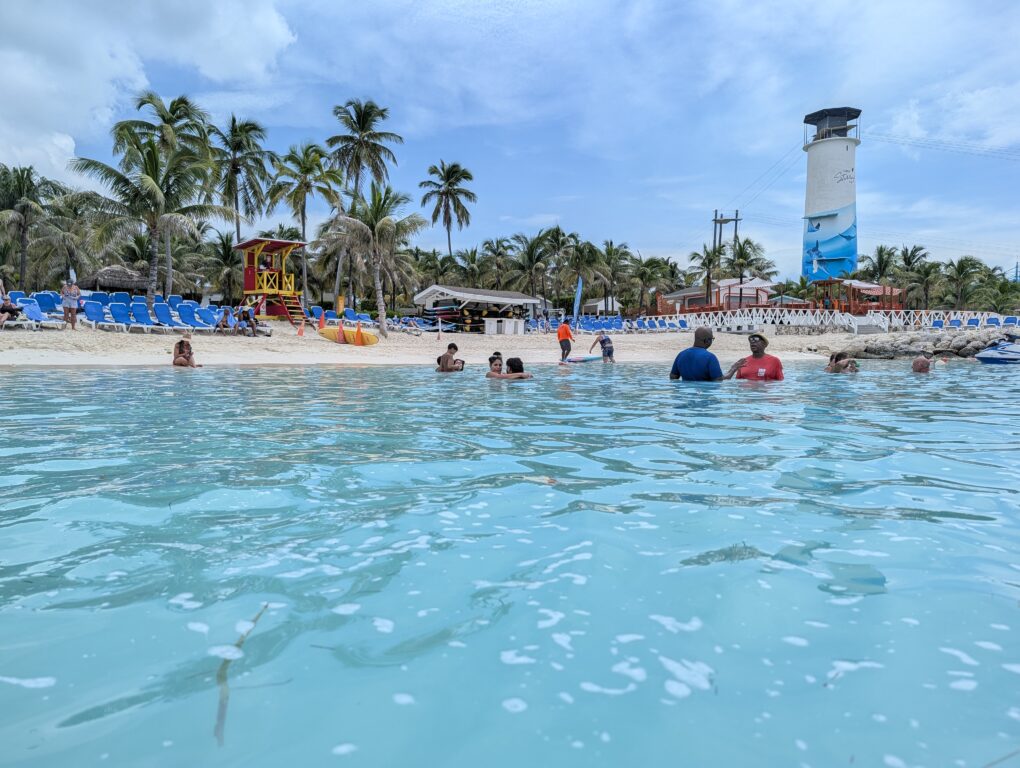 People in the water off the beach at Great Stirrup Cay, Norwegian Cruise LIne's private island.