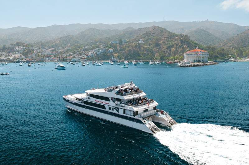 Catalina Express boat motoring towards the coastline