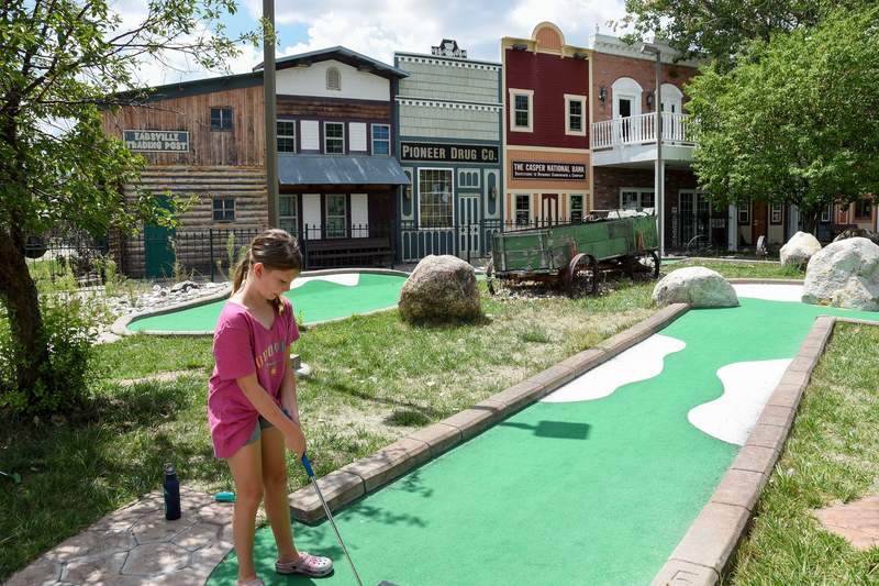 My daughter playing a round of putt-putt golf downtown Casper. Photo credit: Phylicia Stitzel