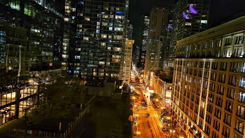 The night lights of downtown Chicago with a view of the Chicago Theater 