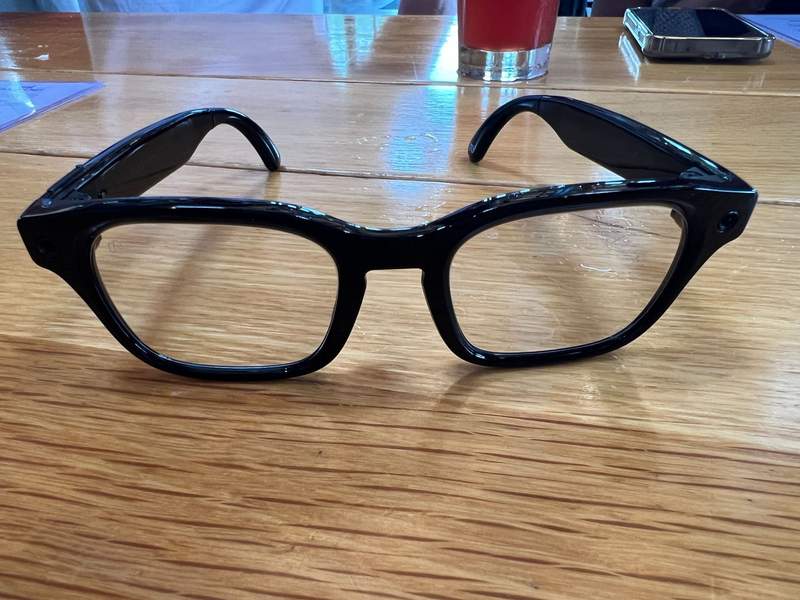 Meta Adventurer AI glasses on a wooden table