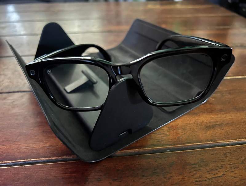 Meta Adventurer glasses in their charging case.