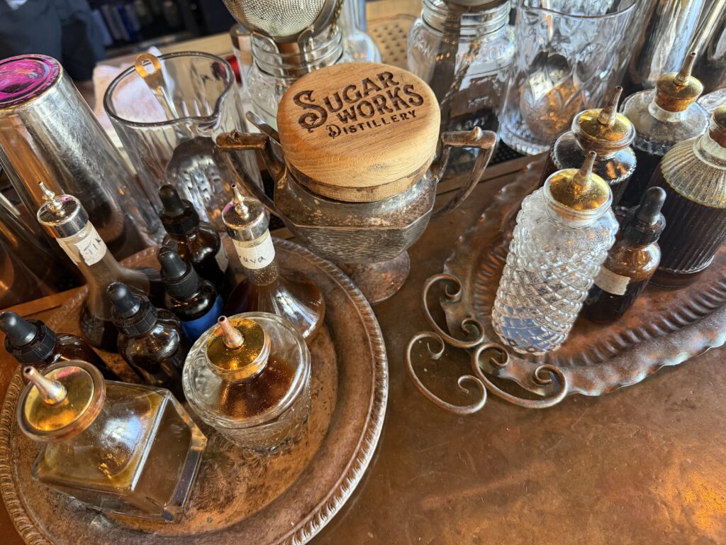 Cocktail bitters in antique glass bottles at Sugar Works Distillery