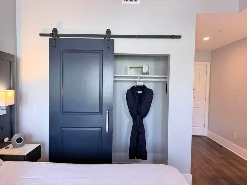 Hilton Head Health single room with a robe hanging in the closet