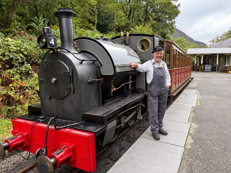  Steam locomotive and engineer on the Talyllyn Railway in Wales