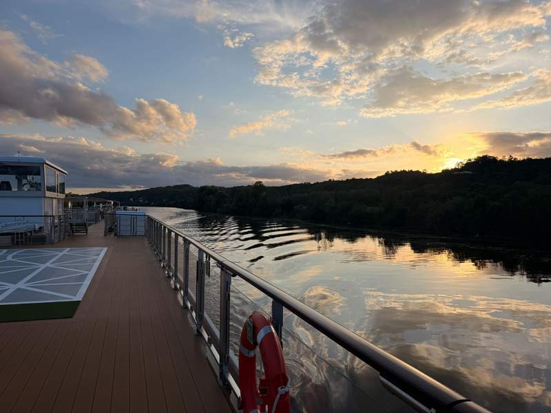 Cruising the Seine River at sunset on the Viking Paris to Normandy itinerary