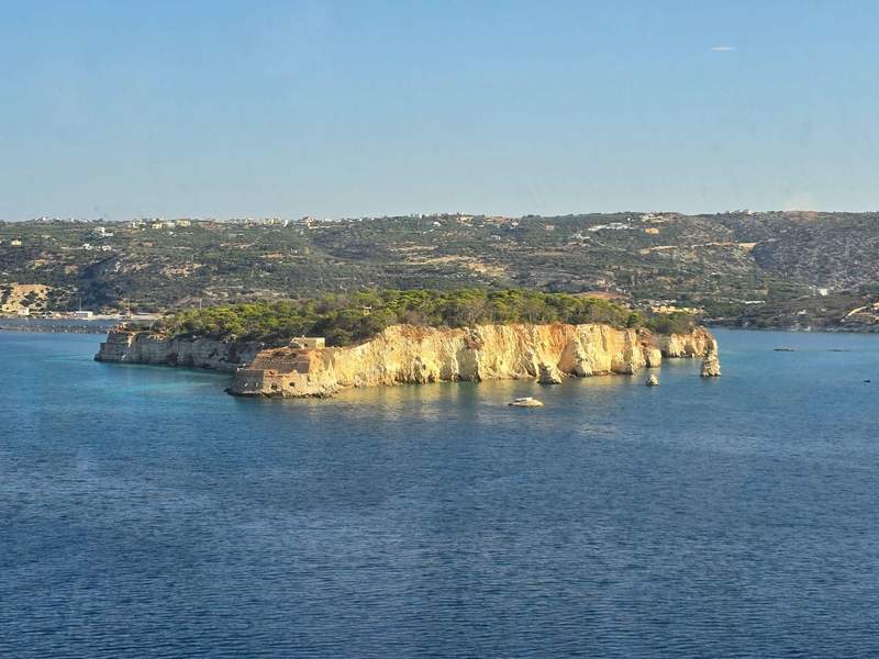 Rocky island coastline and blue Mediterranean waters viewed from Celebrity Ascent